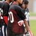 Members of the Ypsilanti Community High School football team watch from the sideline during practice at the school on Monday, August 12, 2013. Melanie Maxwell | AnnArbor.com